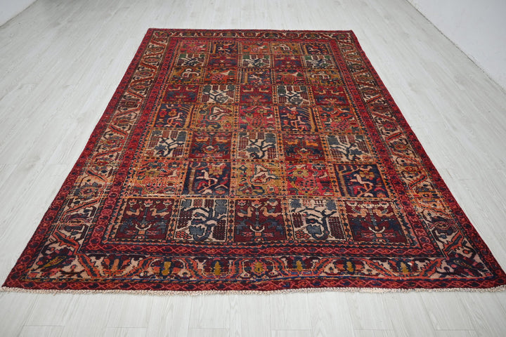 red Large rug 6' 7" x 9' 3"
