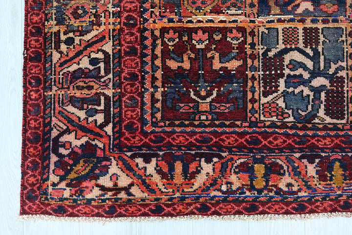 red Large rug 6' 7" x 9' 3"