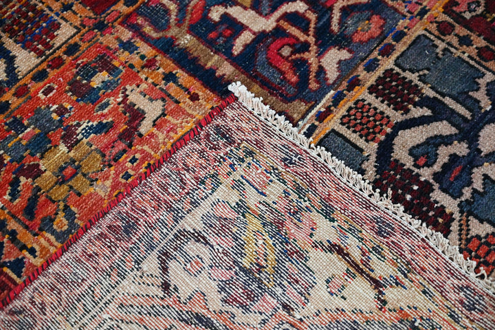 red Large rug 6' 7" x 9' 3"