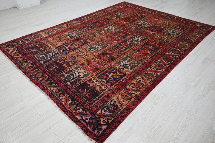 red Large rug 6' 7" x 9' 3"