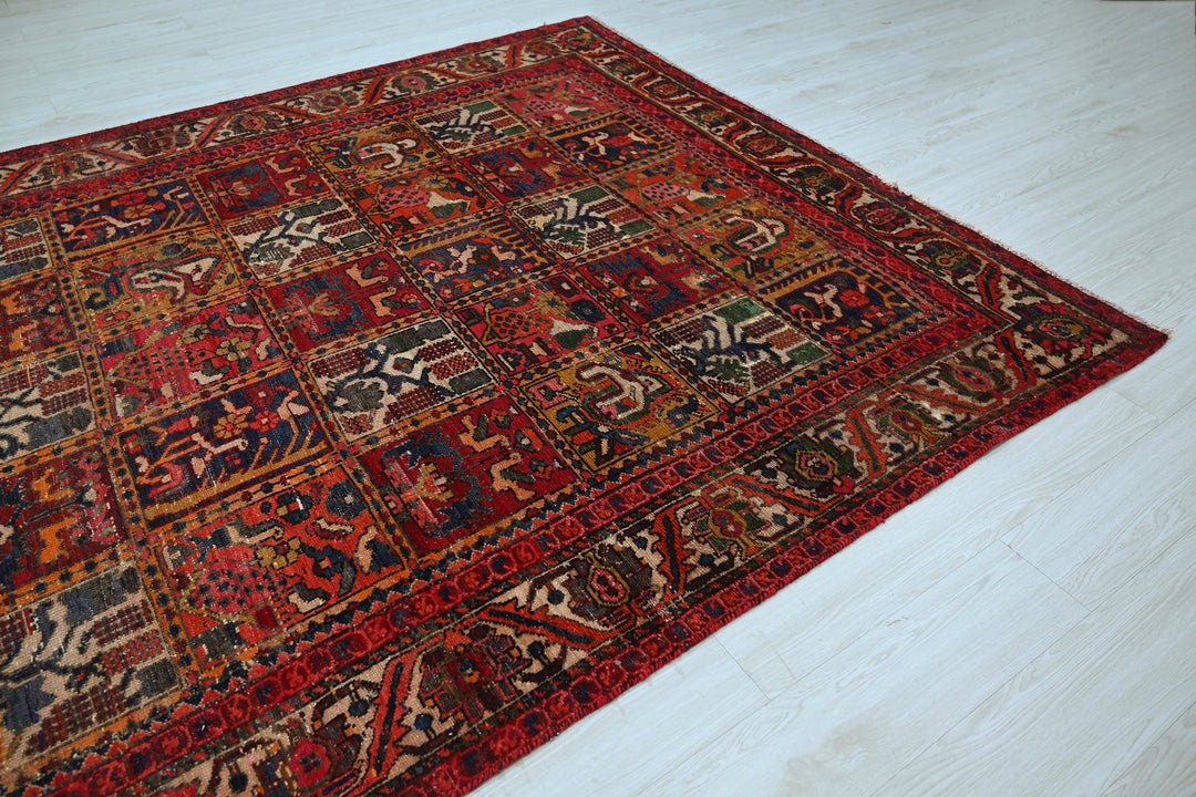 red Large rug 6' 7" x 9' 3"