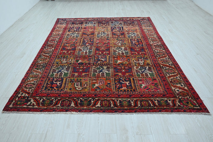 red Large rug 6' 7" x 9' 3"