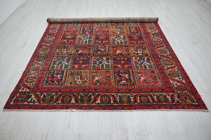 red Large rug 6' 7" x 9' 3"
