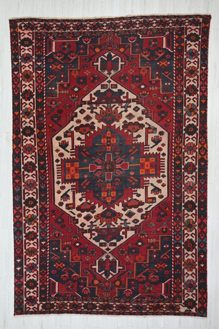 red Medium rug 9' 3" x 6' 3"