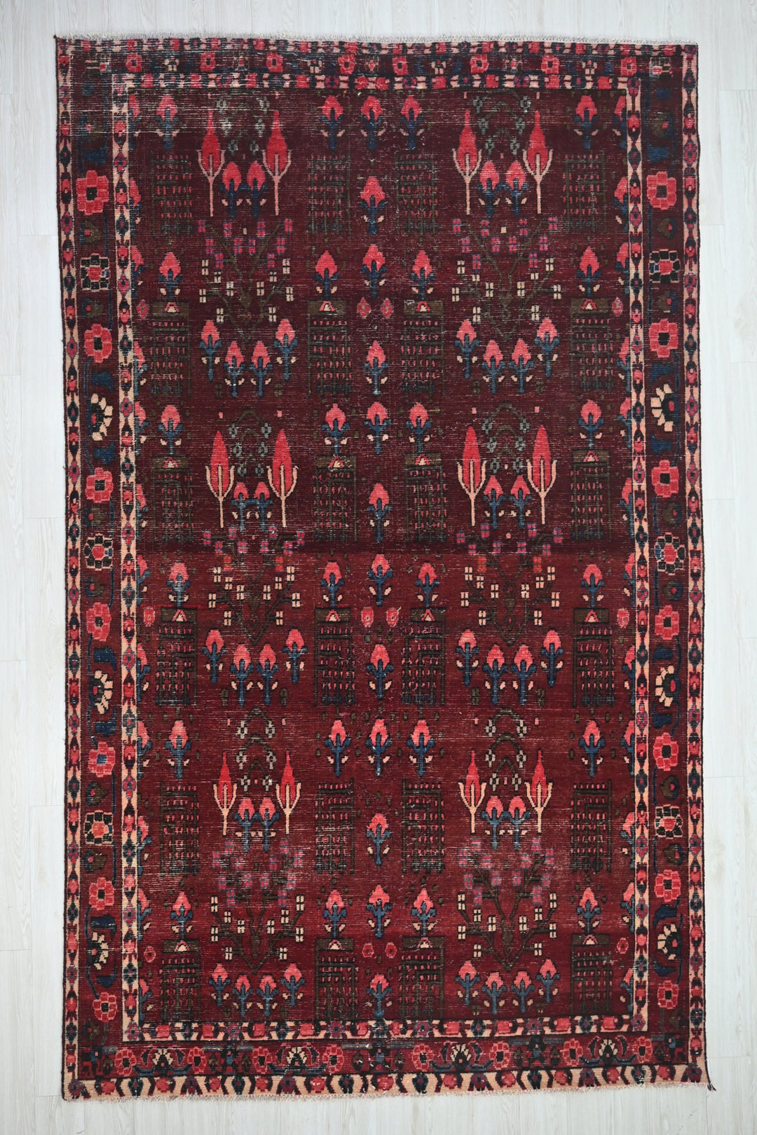 red Large rug 6' 9" x 11' 2"