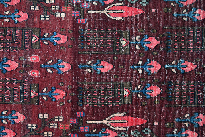 red Large rug 6' 9" x 11' 2"