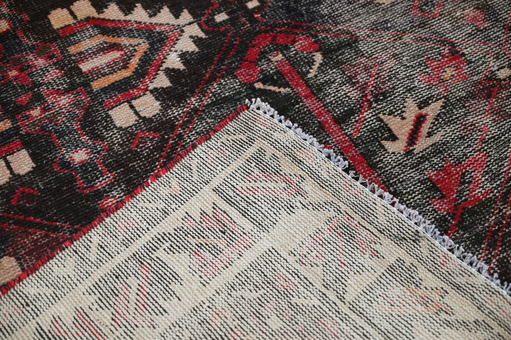black Large rug 6' 10" x 9' 7"