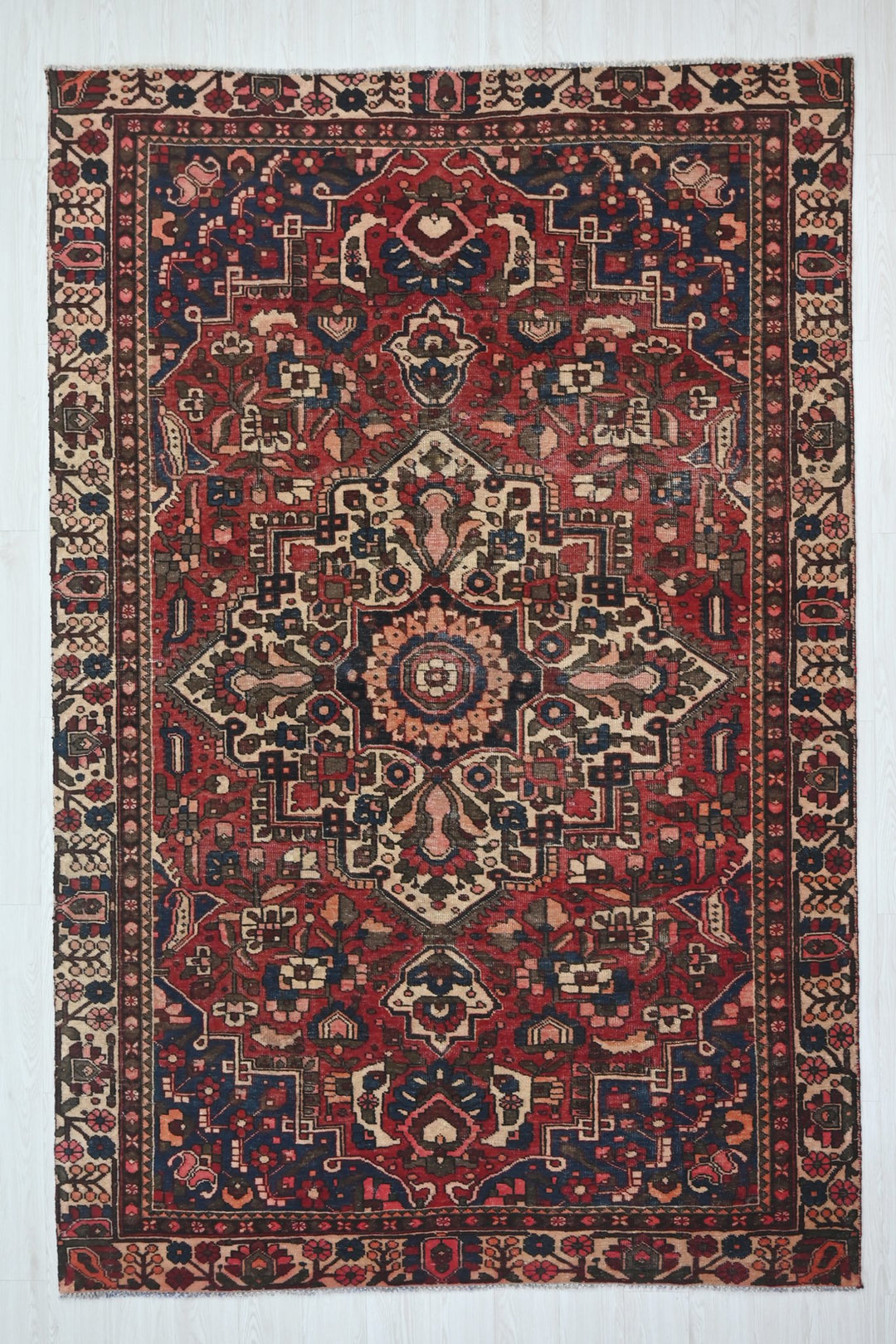 red Large rug 6' 3" x 9' 8"