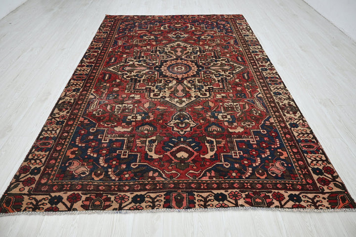 red Large rug 6' 3" x 9' 8"