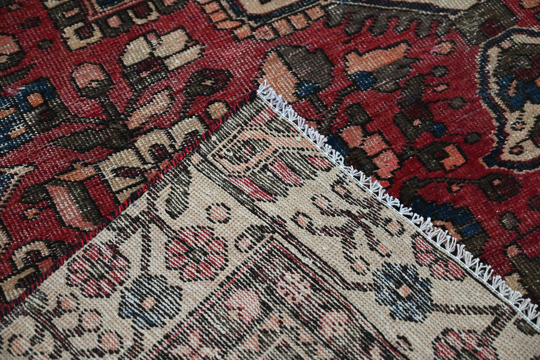 red Large rug 6' 3" x 9' 8"