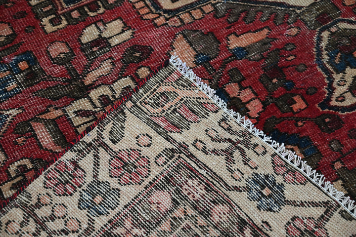 red Large rug 6' 3" x 9' 8"