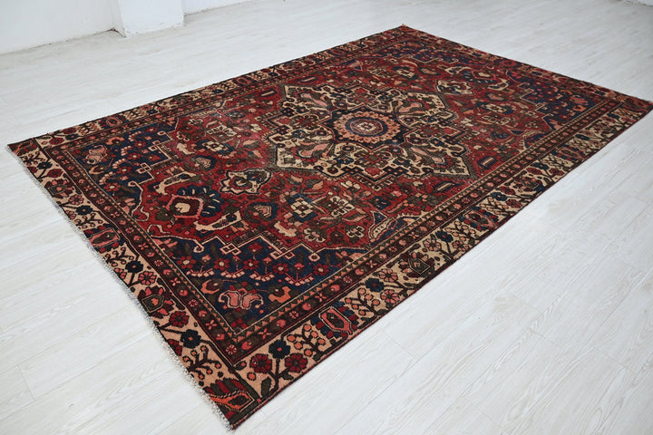 red Large rug 6' 3" x 9' 8"