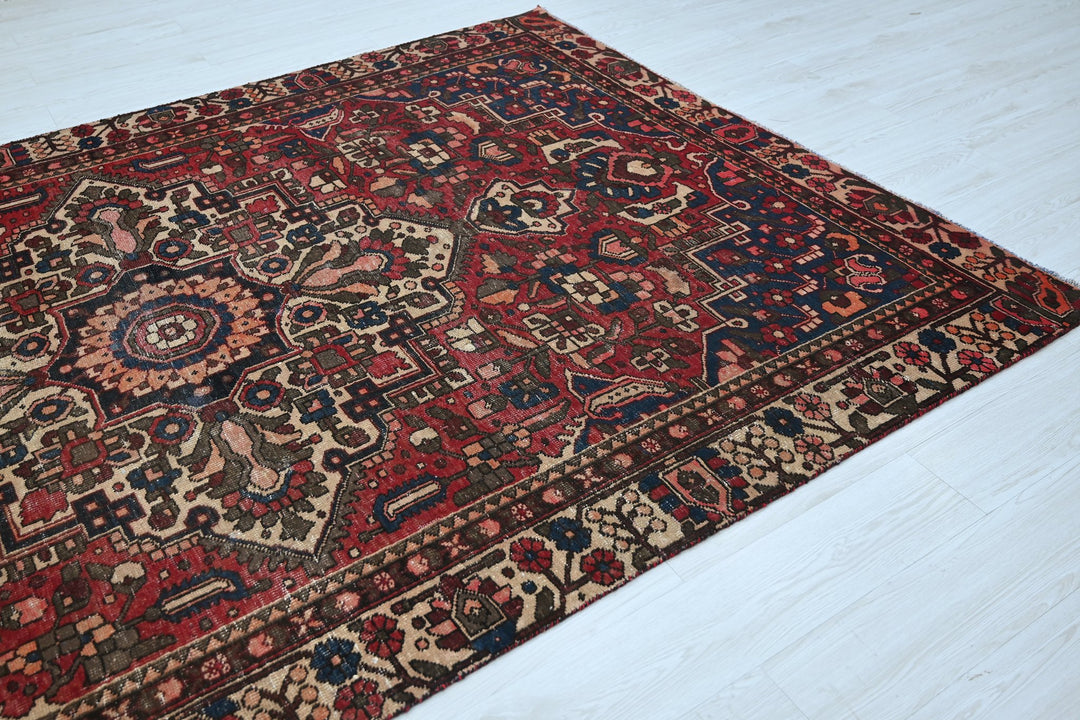 red Large rug 6' 3" x 9' 8"