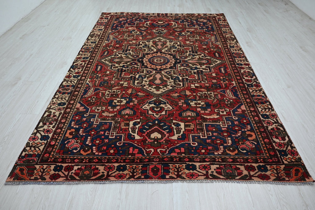 red Large rug 6' 3" x 9' 8"
