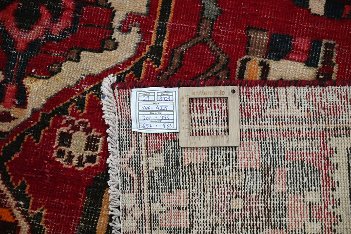 red Large rug 6' 7" x 9' 8"