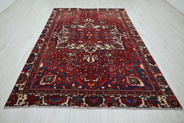 red Medium rug 5' 11" x 9' 0"