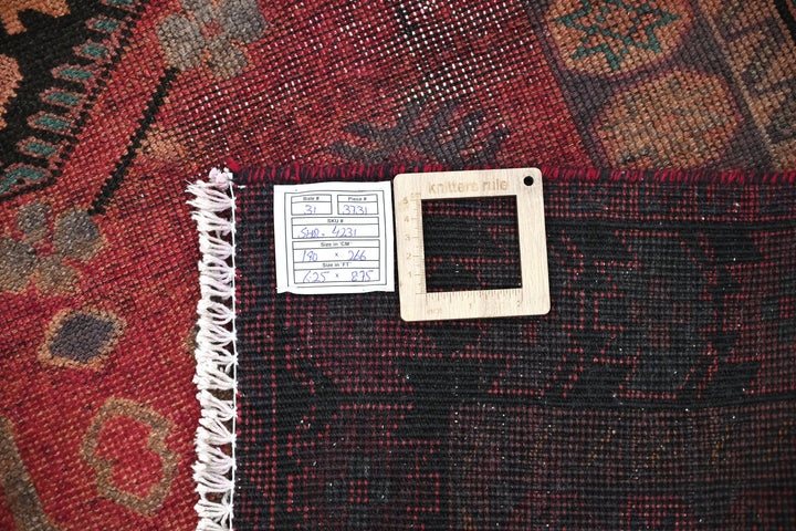 red Medium rug 6' 3" x 8' 9"