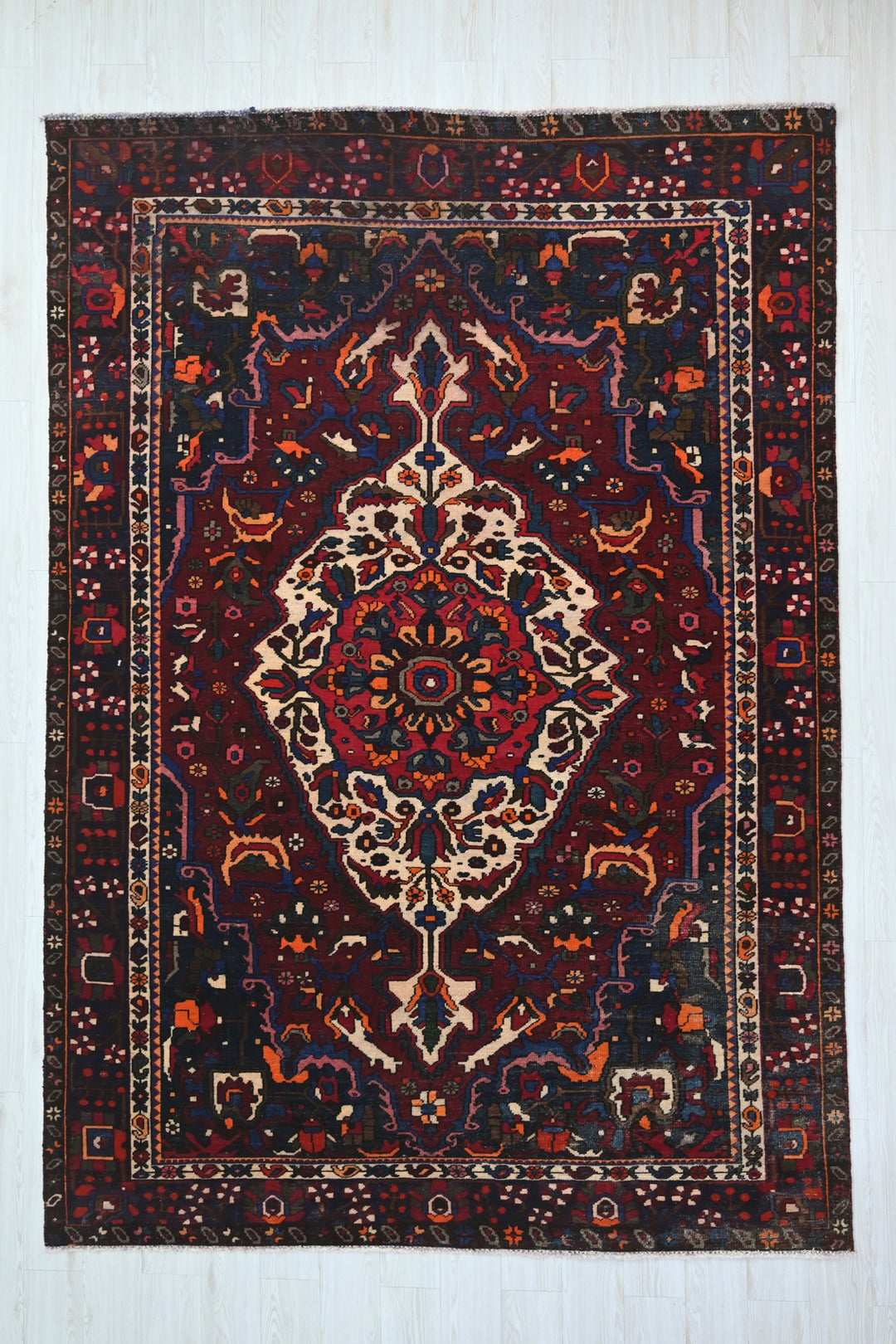 red Large rug 6' 8" x 9' 8"