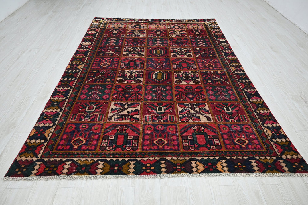 red Medium rug 6' 2" x 9' 0"