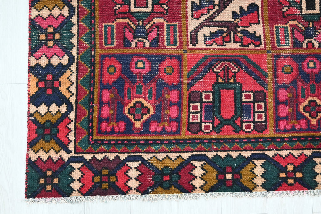 red Medium rug 6' 2" x 9' 0"