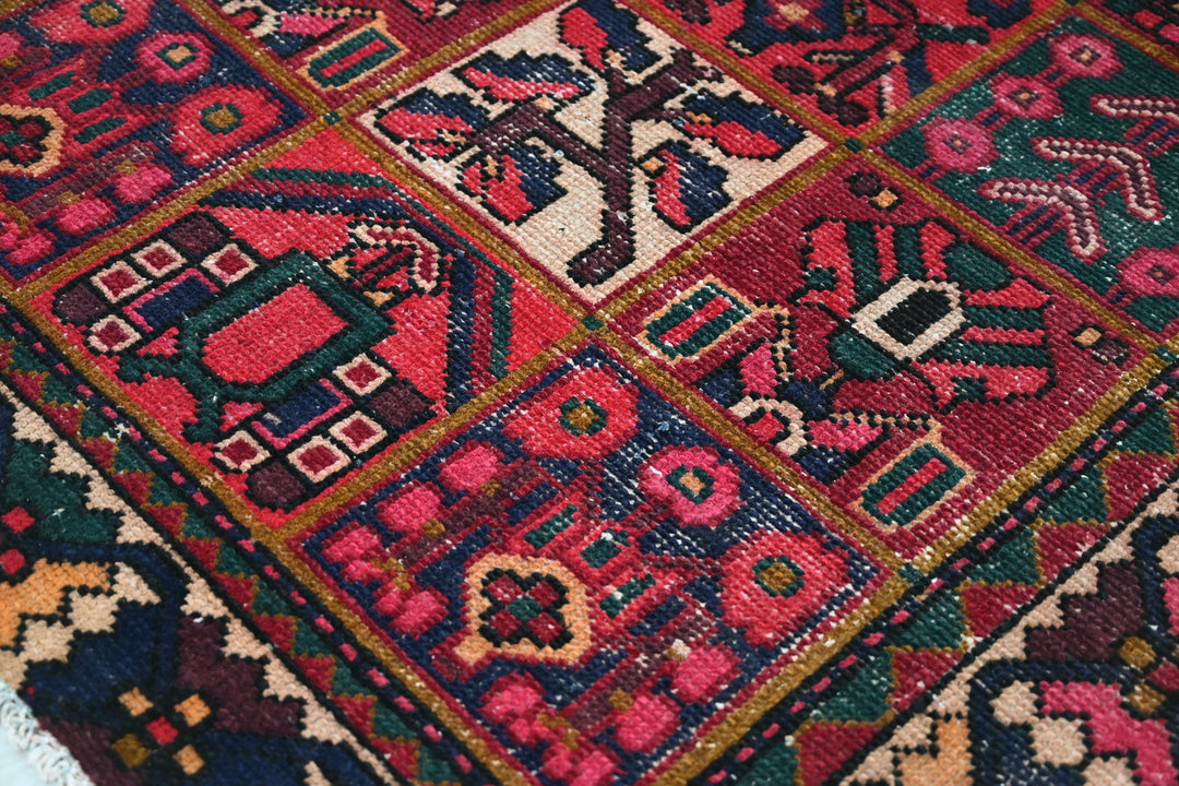 red Medium rug 6' 2" x 9' 0"