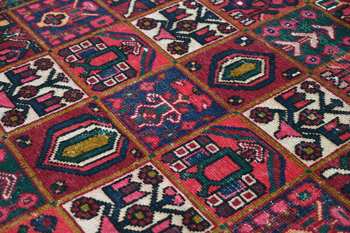 red Medium rug 6' 2" x 9' 0"