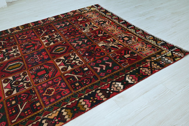 red Medium rug 6' 2" x 9' 0"