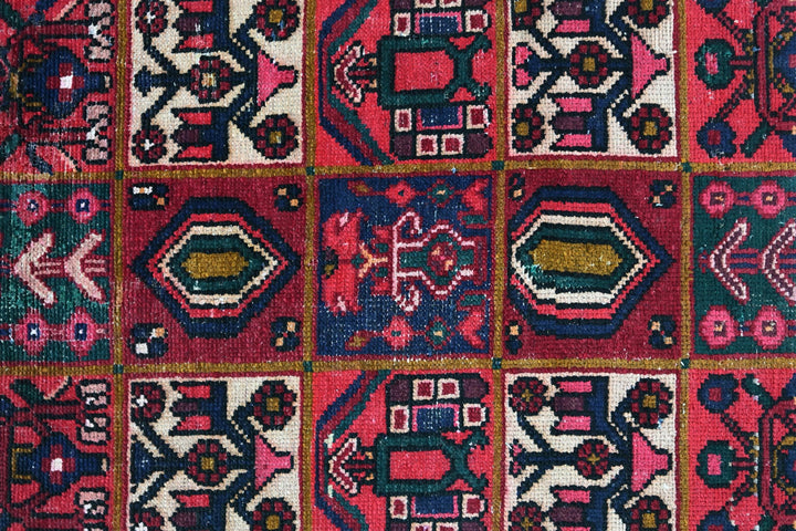 red Medium rug 6' 2" x 9' 0"