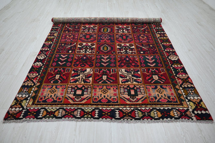 red Medium rug 6' 2" x 9' 0"