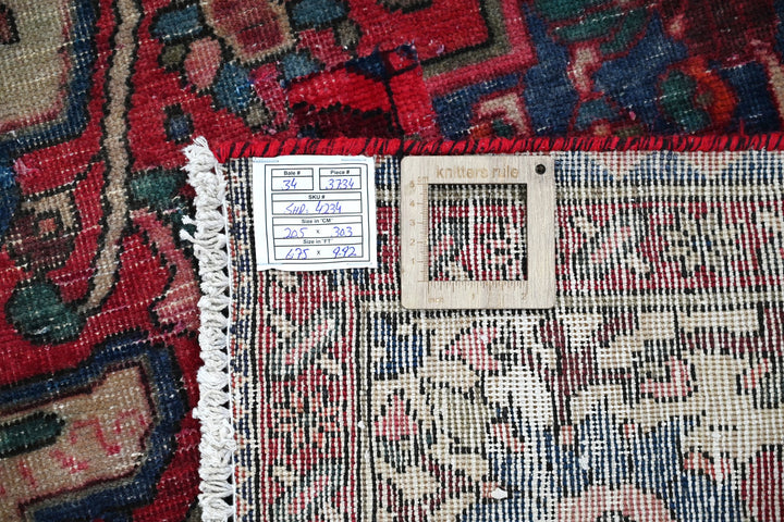 red Large rug 6' 9" x 9' 11"