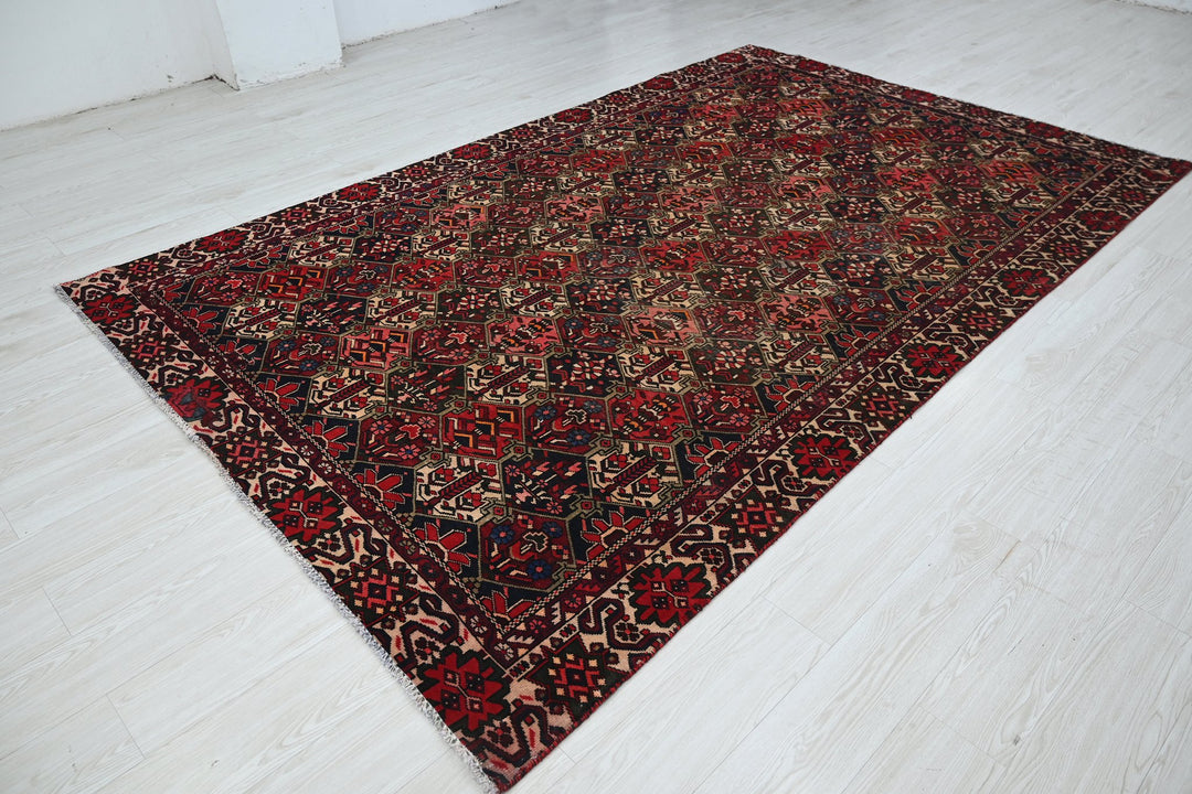 red Large rug 6' 3" x 10' 2"