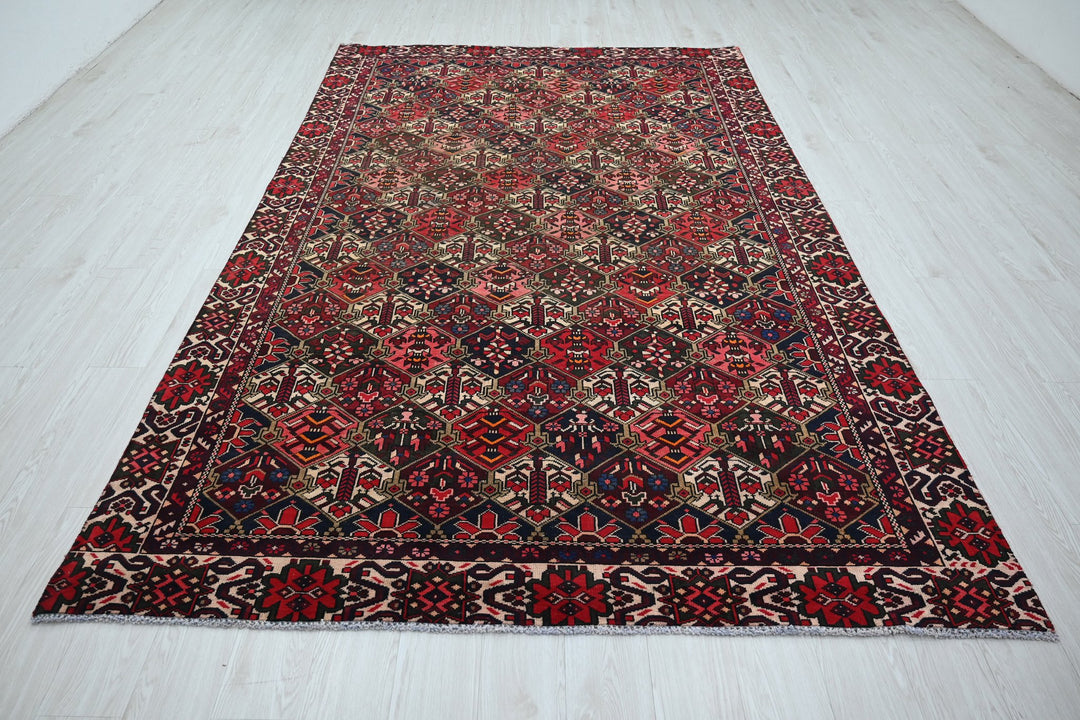 red Large rug 6' 3" x 10' 2"