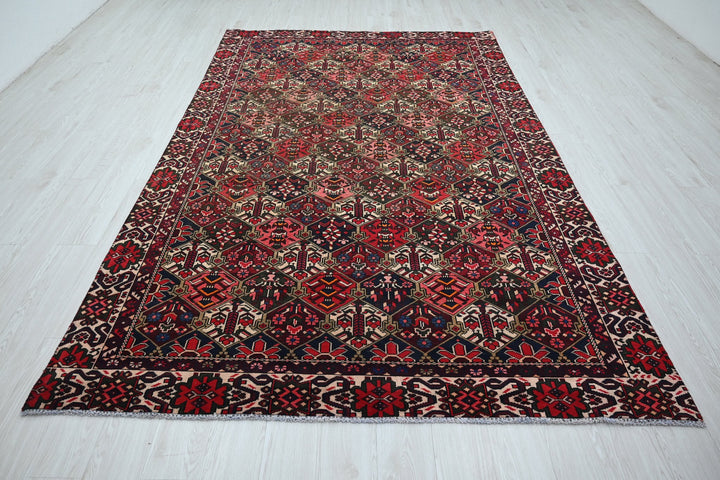 red Large rug 6' 3" x 10' 2"