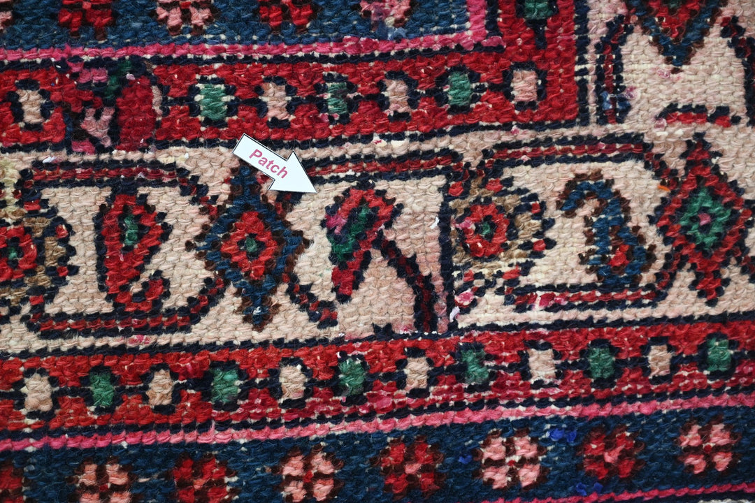 red Large rug 6' 8" x 9' 1"