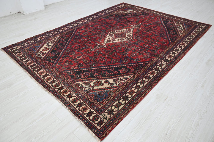 red Large rug 6' 11" x 9' 10"