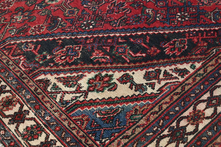 red Large rug 6' 11" x 9' 10"