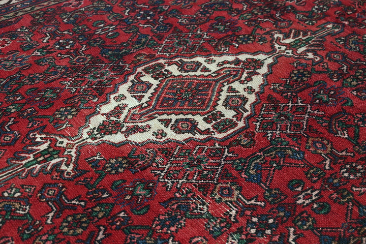 red Large rug 6' 11" x 9' 10"