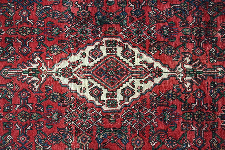 red Large rug 6' 11" x 9' 10"