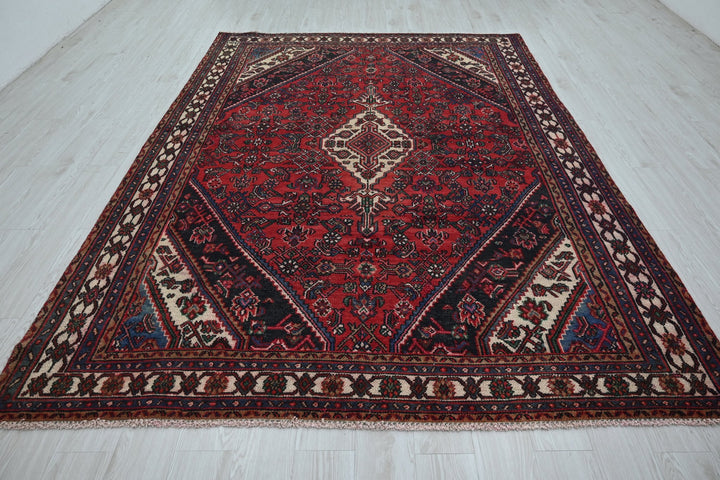 red Large rug 6' 11" x 9' 10"