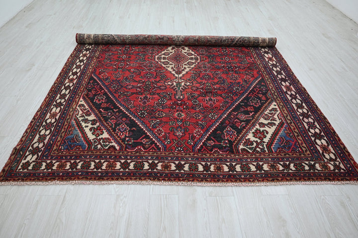 red Large rug 6' 11" x 9' 10"