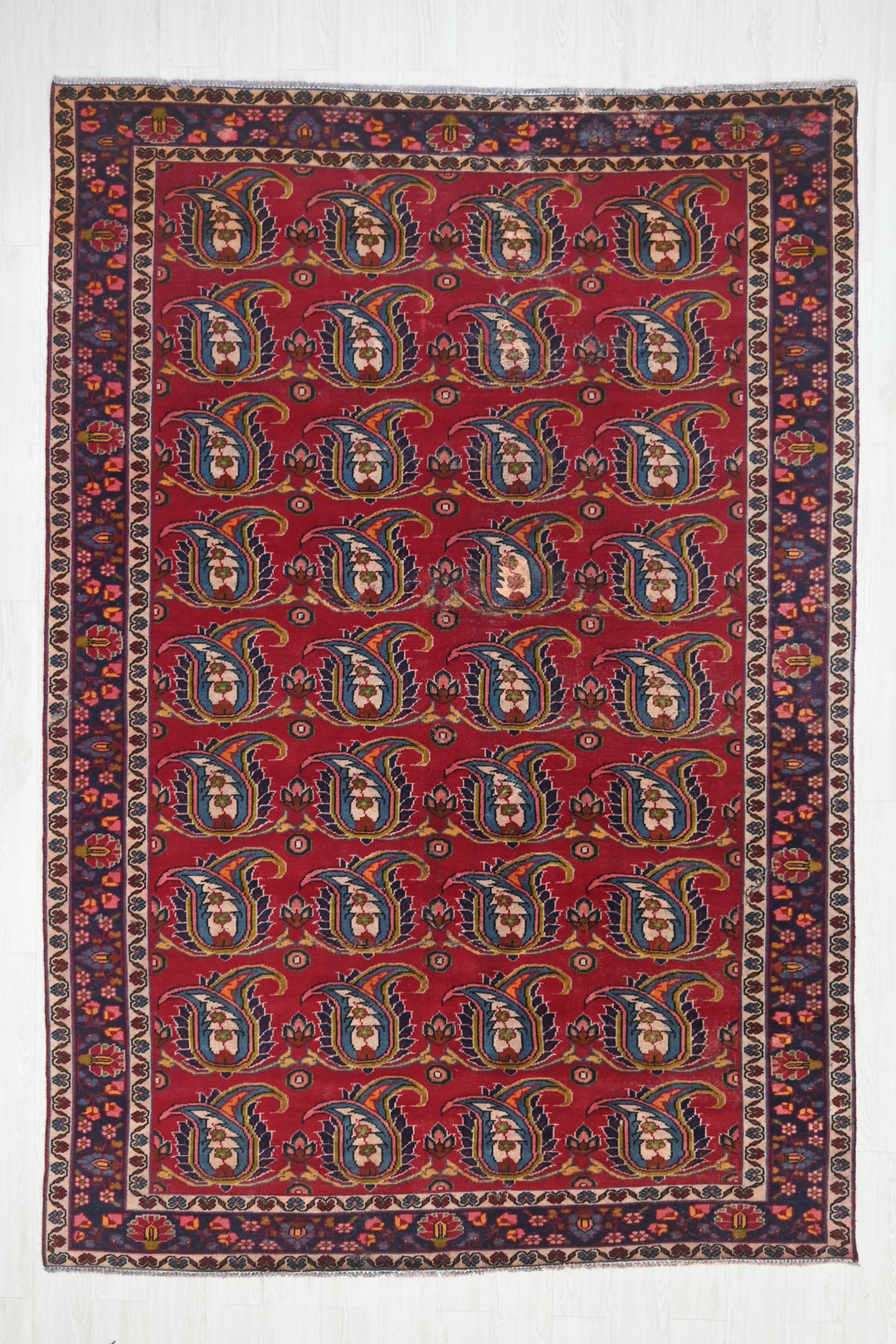 red Large rug 6' 10" x 9' 11"