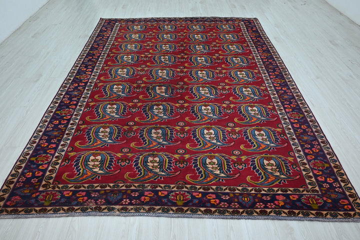 red Large rug 6' 10" x 9' 11"