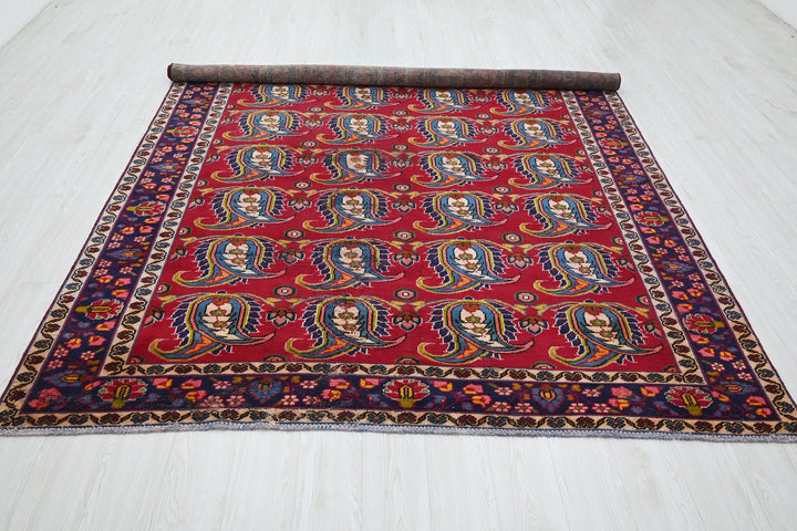 red Large rug 6' 10" x 9' 11"