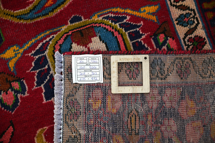 red Large rug 6' 10" x 9' 11"