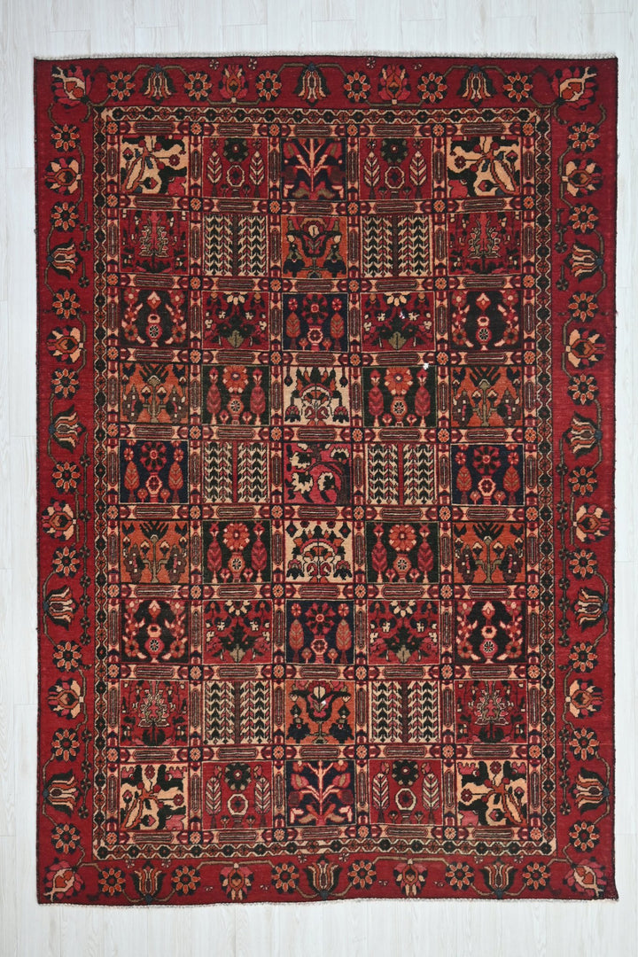red Medium rug 6' 6" x 9' 4"
