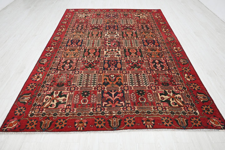 red Medium rug 6' 6" x 9' 4"