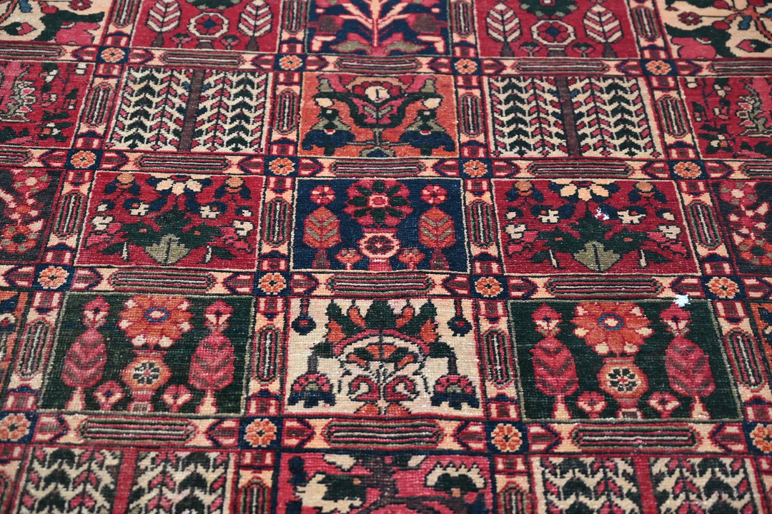 red Medium rug 6' 6" x 9' 4"