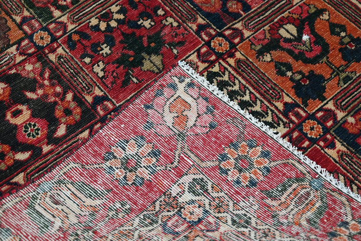red Medium rug 6' 6" x 9' 4"