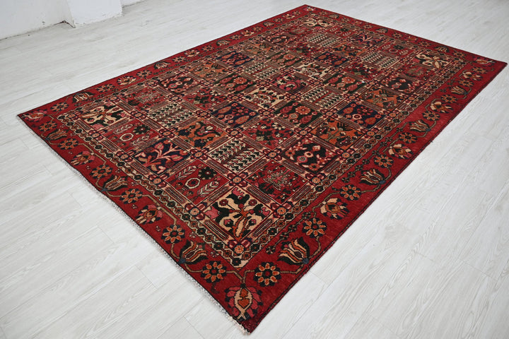 red Medium rug 6' 6" x 9' 4"