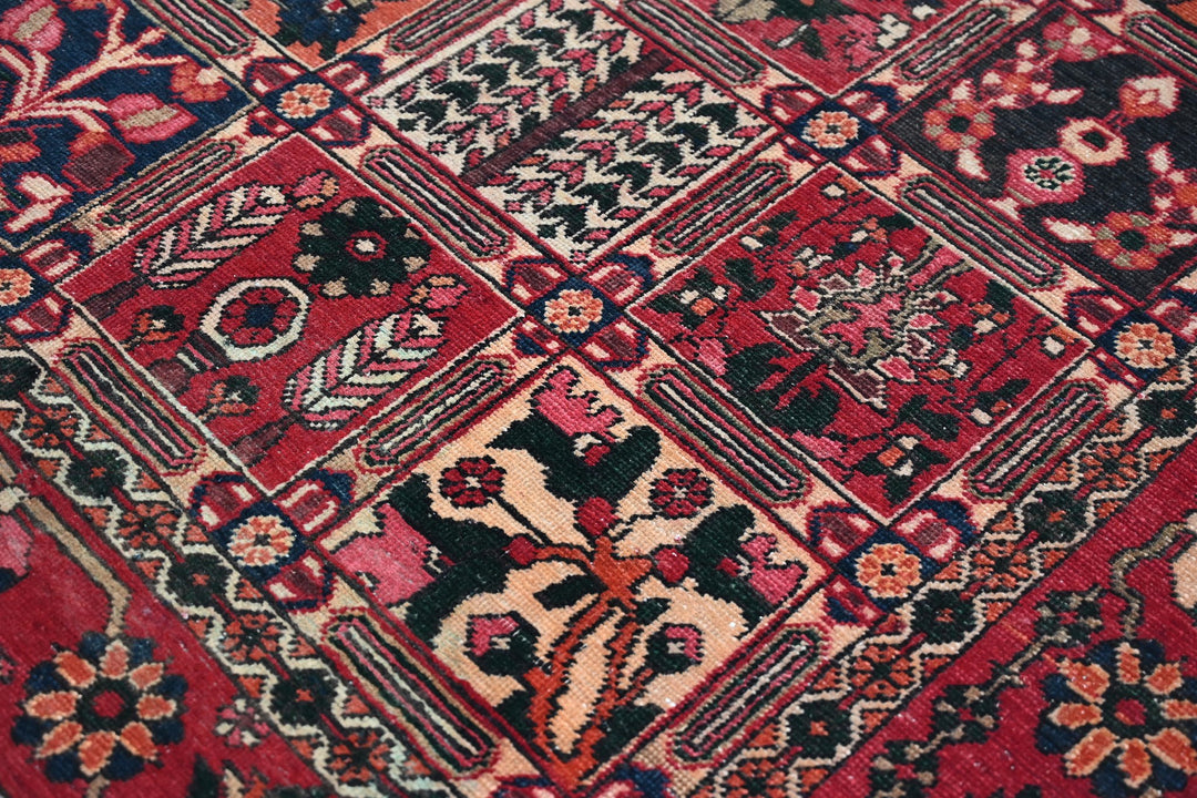 red Medium rug 6' 6" x 9' 4"